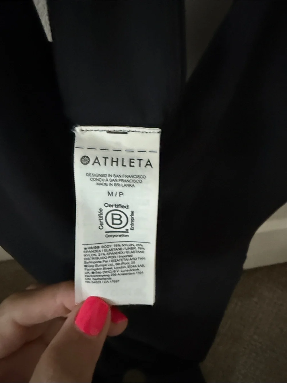 Athleta Transcend Cropped Black Women's Racerback Bodysuit With Pockets